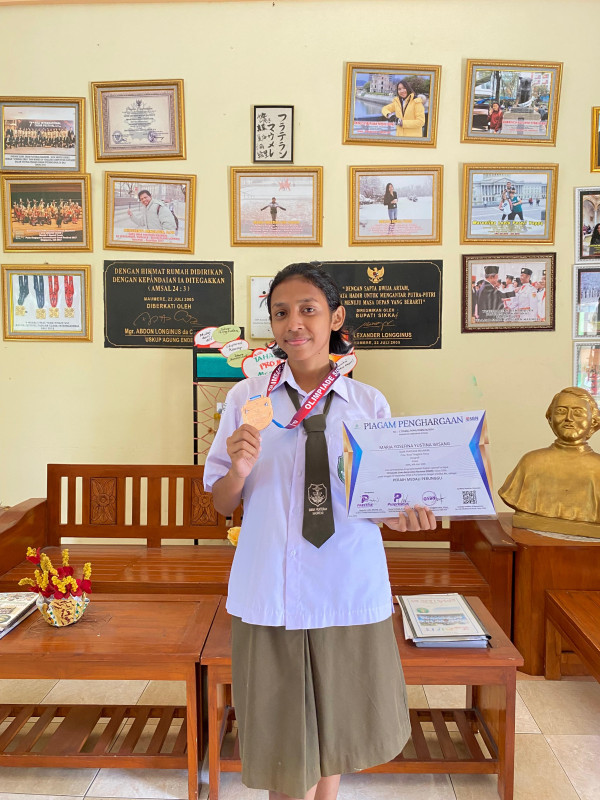 YUSTIN, SISWI SMATER RAIH MEDALI PERUNGGU DALAM RANGKA OLIMPIADE SISWA BERTARAF NASIONAL (OSBN) BIDANG GEOGRAFI TAHUN 2024